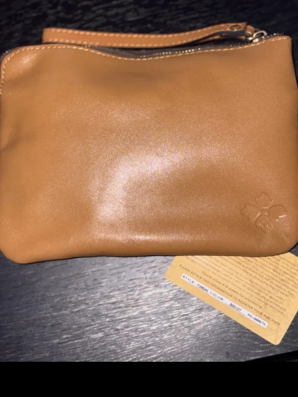 Authentic brand new Patricia Nash clutch in the color biscuit- never used-perect